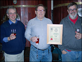 Brian Kirton present the award to the MD and Head Brewer - Feb 2006