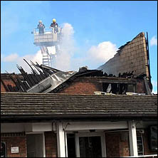 View of damage to roof