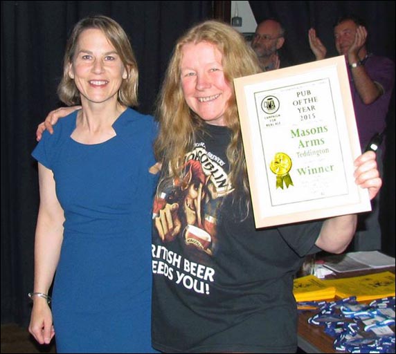 Dr Tania Mathias MP presents the award for Richmond and Hounslow Camra Pub of the Year 2015 to Rae Williams, landlady of the Masons Arms.